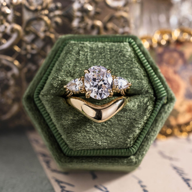 three-stone-oval-diamond-engagement-ring-pear-shaped-diamond-accents-pave-setting-the-marielle-rustic-and-main