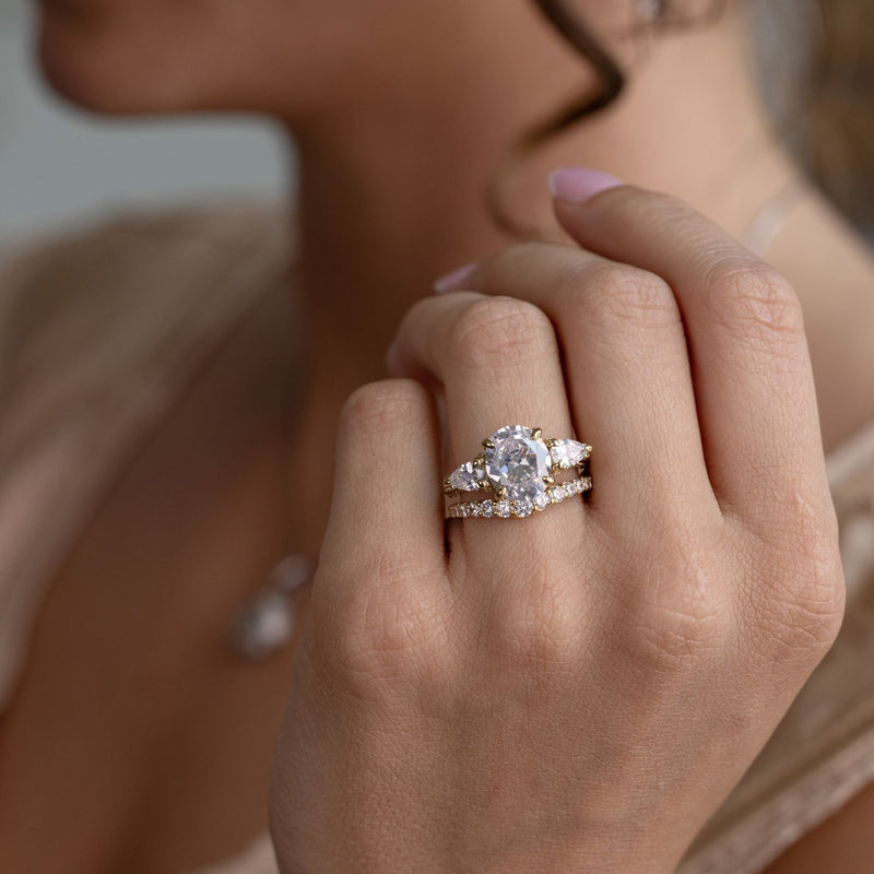 three-stone-oval-diamond-engagement-ring-pear-shaped-diamond-accents-pave-setting-the-marielle-rustic-and-main