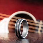 The Man in Black | Men's Titanium Guitar String Wedding Band with Black Whiskey Barrel Wood