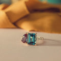 toi-et-moi-engagement-ring-pear-shaped-alexandrite-emerald-cut-london-blue-topaz-the-elara-rustic-and-main