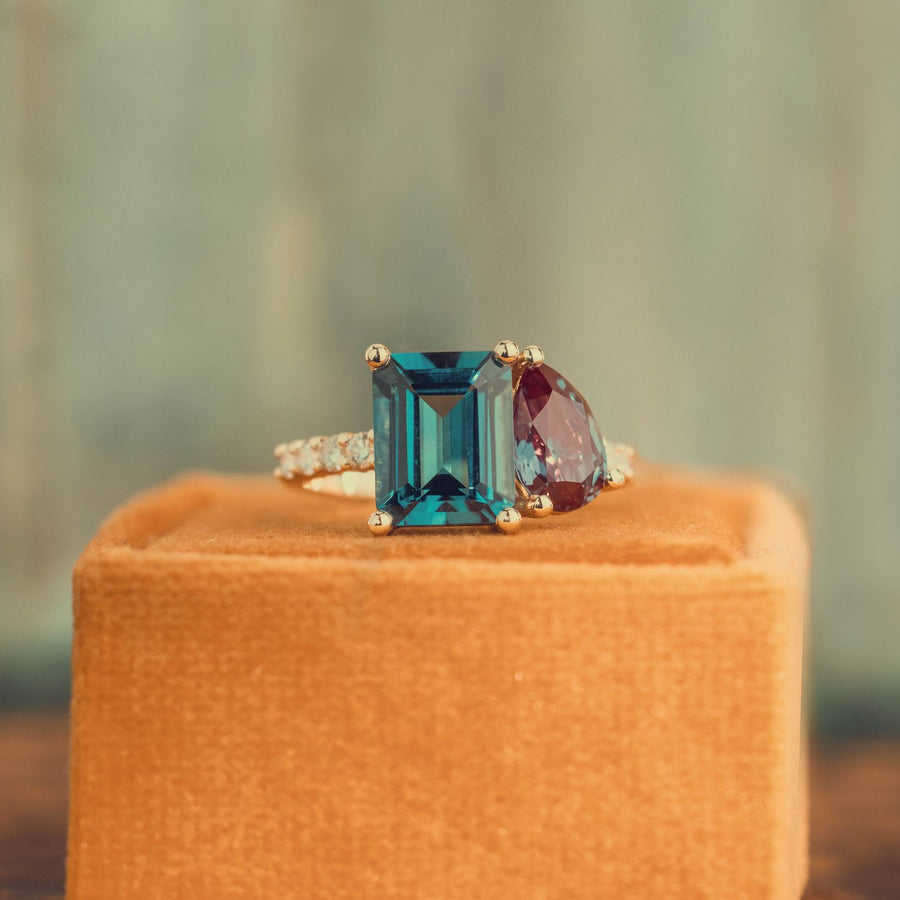 toi-et-moi-engagement-ring-pear-shaped-alexandrite-emerald-cut-london-blue-topaz-the-elara-rustic-and-main