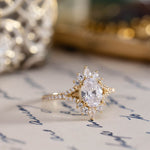 vintage-inspired-oval-diamond-engagement-ring-starburst-diamond-halo-pave-split-shank-setting-the-genevieve-rustic-and-main