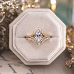 vintage-inspired-oval-diamond-engagement-ring-starburst-diamond-halo-pave-split-shank-setting-the-genevieve-rustic-and-main