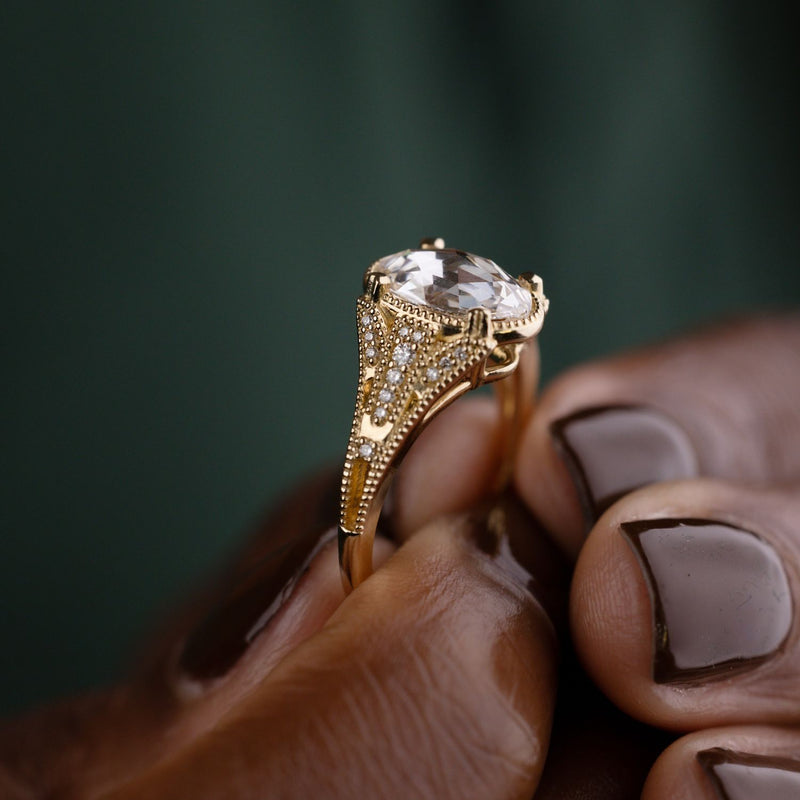 vintage-inspired-rose-cut-oval-diamond-engagement-ring-eiffel-tower-inspired-shank-diamond-milgrain-accents-the-amelie-rustic-and-main