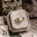 vintage-inspired-three-stone-engagement-ring-oval-moonstone-green-tourmaline-cabochon-stones-the-myzelle-rustic-and-main