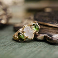 vintage-inspired-three-stone-engagement-ring-oval-moonstone-green-tourmaline-cabochon-stones-the-myzelle-rustic-and-main