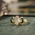 vintage-inspired-three-stone-engagement-ring-oval-moonstone-green-tourmaline-cabochon-stones-the-myzelle-rustic-and-main